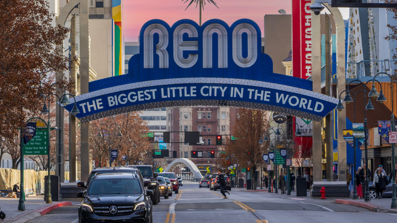 Reno, Nevada sign over road