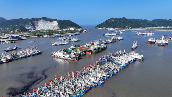TAIZHOU, CHINA - AUGUST 06: Fishing boats dock at a harbor as Typhoon Dolphin approaches on August 6, 2026 in Taizhou, Zhejiang Province of China. As Typhoon Dolphin, the 13th typhoon of 2026, is approaching the East China Sea, Zhejiang.
