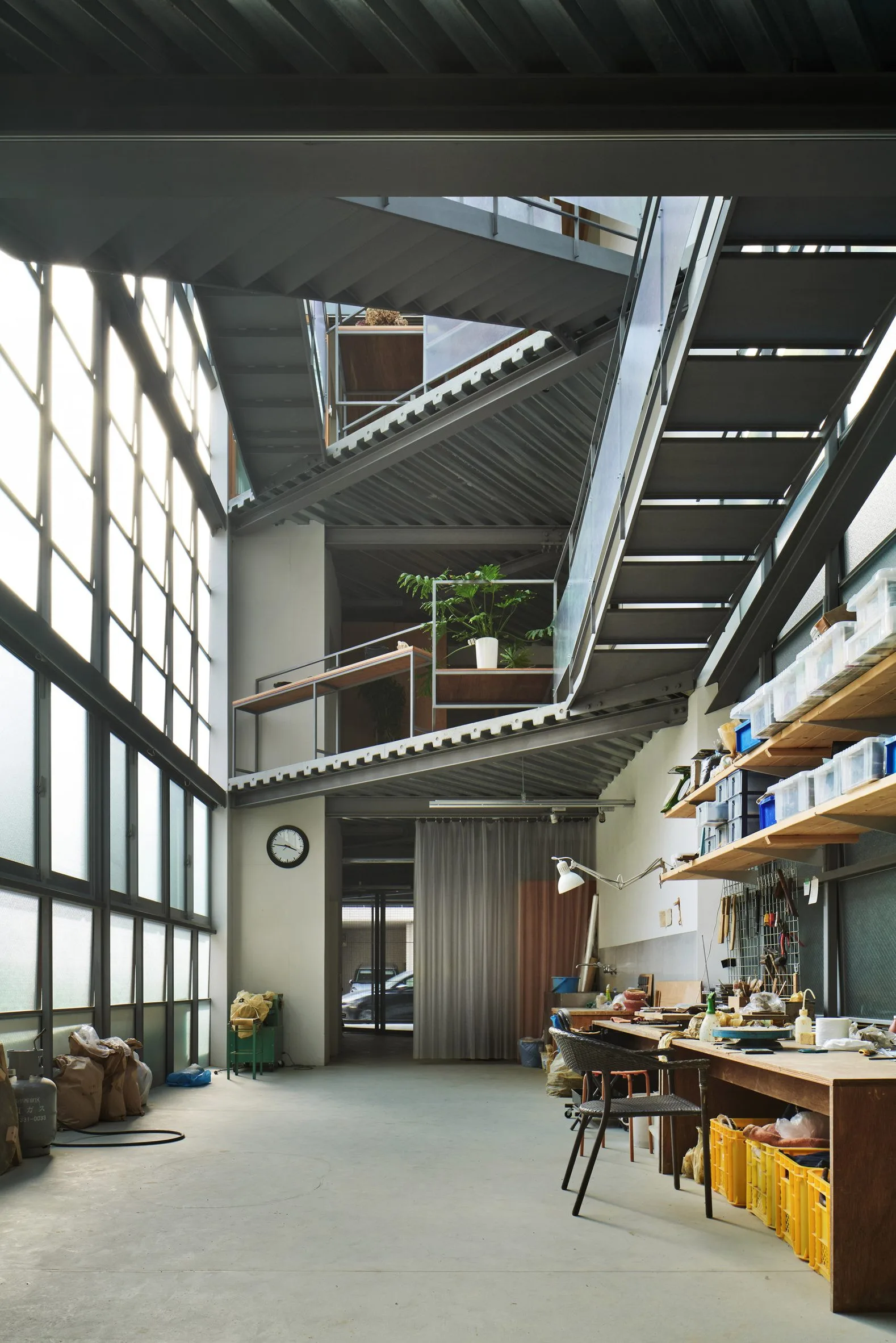 Interior featuring two skylit voids serving as vertical circulation areas.