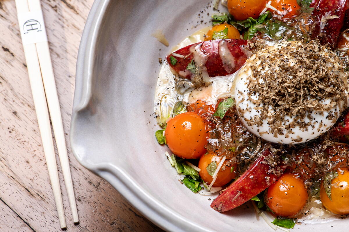 A tomato and truffled burrata salad at Chateau Hanare